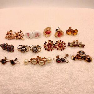 Earrings , 12 pair of screw on, Items # A-386-A-397,. wt. 82 grams .